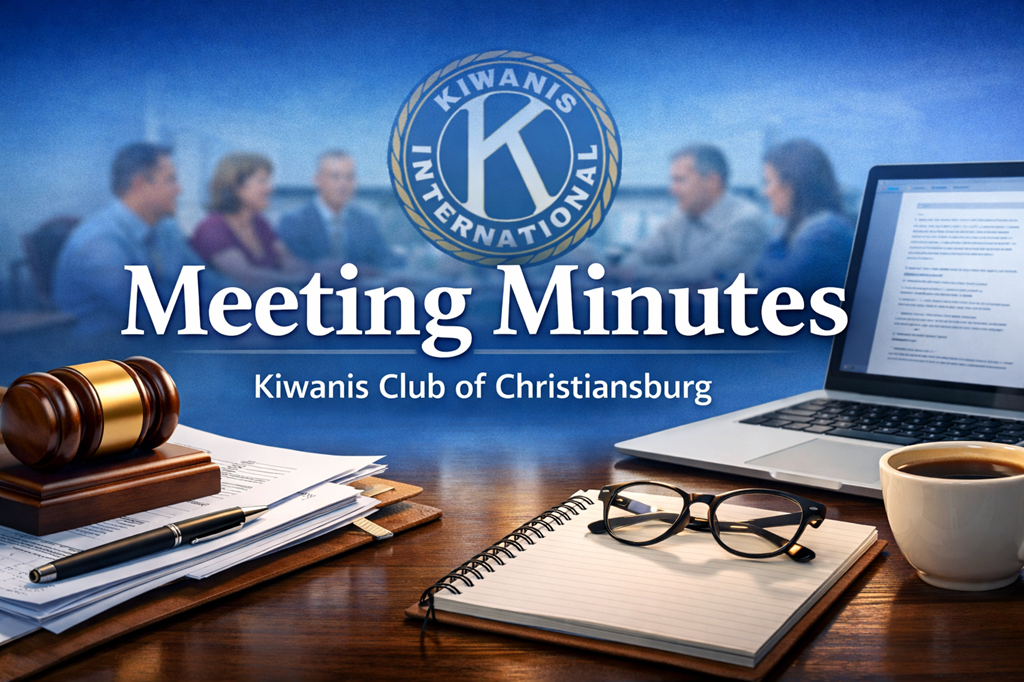 Kiwanis Club of Christiansburg “Meeting Minutes” banner showing the Kiwanis International logo over a blurred meeting scene, with a gavel on papers and pen at left and a laptop, notebook, glasses, and coffee cup on a table at right.