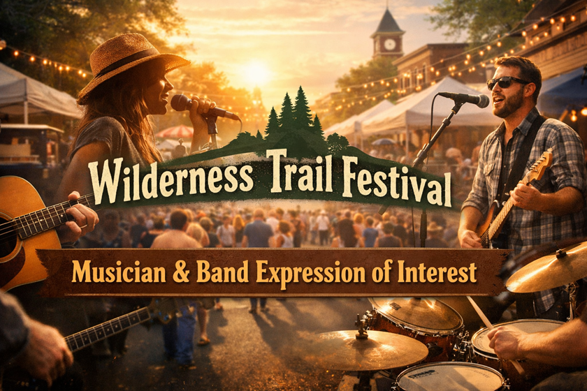 **Alt text:** Photorealistic banner for the Kiwanis Wilderness Trail Festival showing local musicians performing on outdoor stages in downtown Christiansburg at sunset. A singer with an acoustic guitar, an electric guitarist, and a drummer perform before a crowd beneath string lights and festival tents. Overlaid text reads “Wilderness Trail Festival – Musician & Band Expression of Interest.”