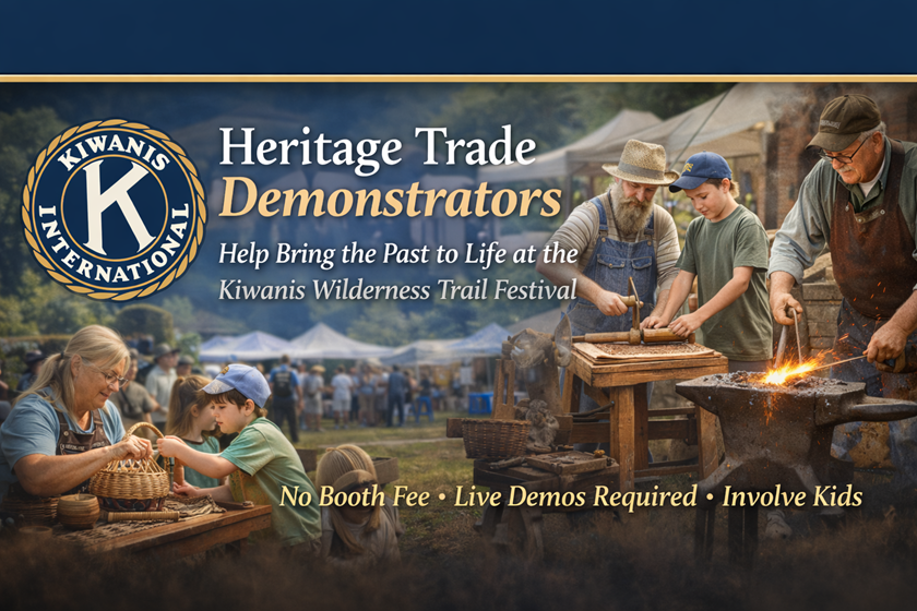 Alt text: **Photorealistic wide banner promoting “Heritage Trade Demonstrators” for the Kiwanis Wilderness Trail Festival, featuring the Kiwanis International emblem on the left and scenes of artisans demonstrating traditional crafts—basket weaving with a child and blacksmithing with sparks—set against festival tents and mountains, with text noting “No Booth Fee,” “Live Demos Required,” and “Involve Kids.”
